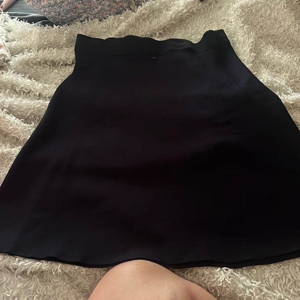 CAbi navy blue A-line skirt size medium 80% Rayon 13% Nylon 2% spandex